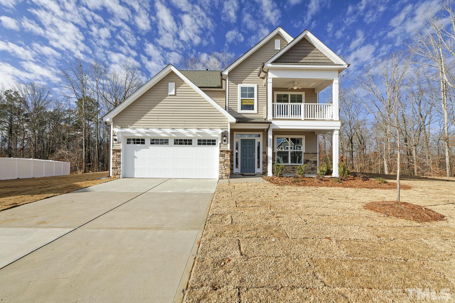 435 Cliffview Drive Garner, NC 27529 - Photo 1 of 45 a front view of a house with a yard and garage