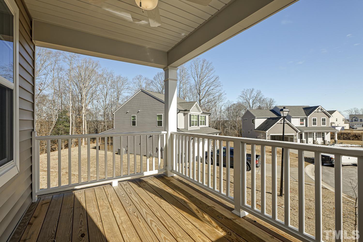 435 Cliffview Drive Garner, NC 27529 - Photo 24 of 45 a view of a balcony with wooden floor