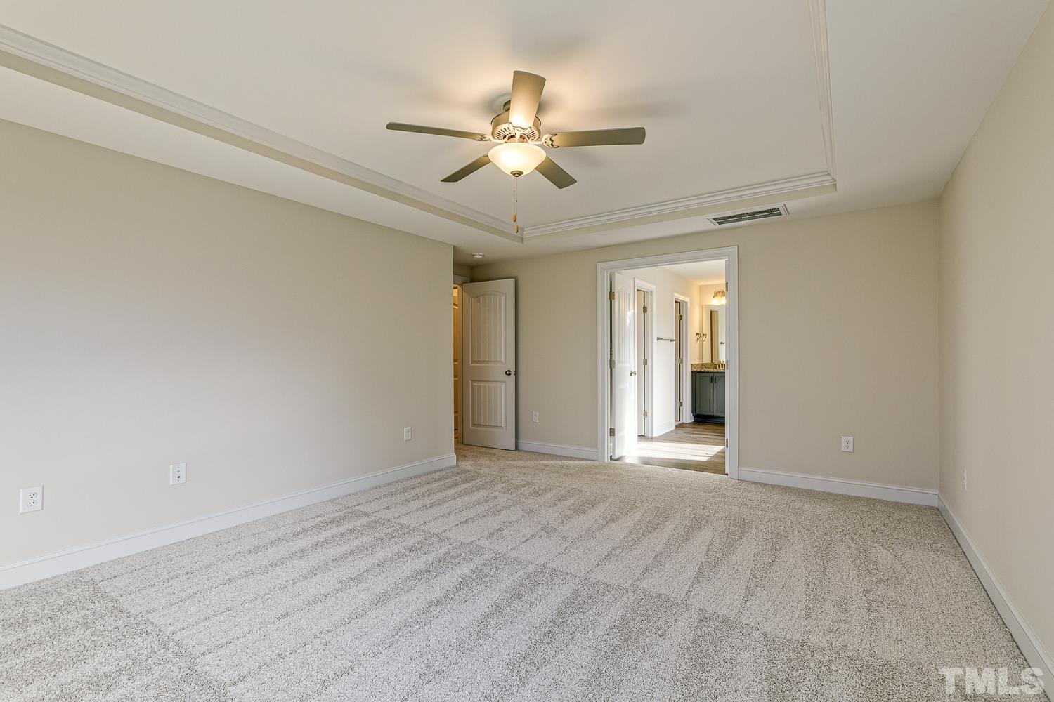 435 Cliffview Drive Garner, NC 27529 - Photo 33 of 45 a view of a livingroom with a ceiling fan and window