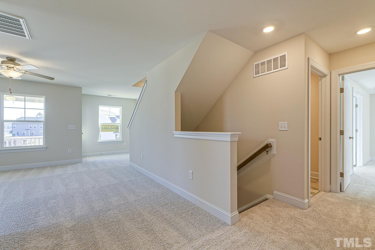 435 Cliffview Drive Garner, NC 27529 - Photo 38 of 45 a view of an empty room with windows & cabinet