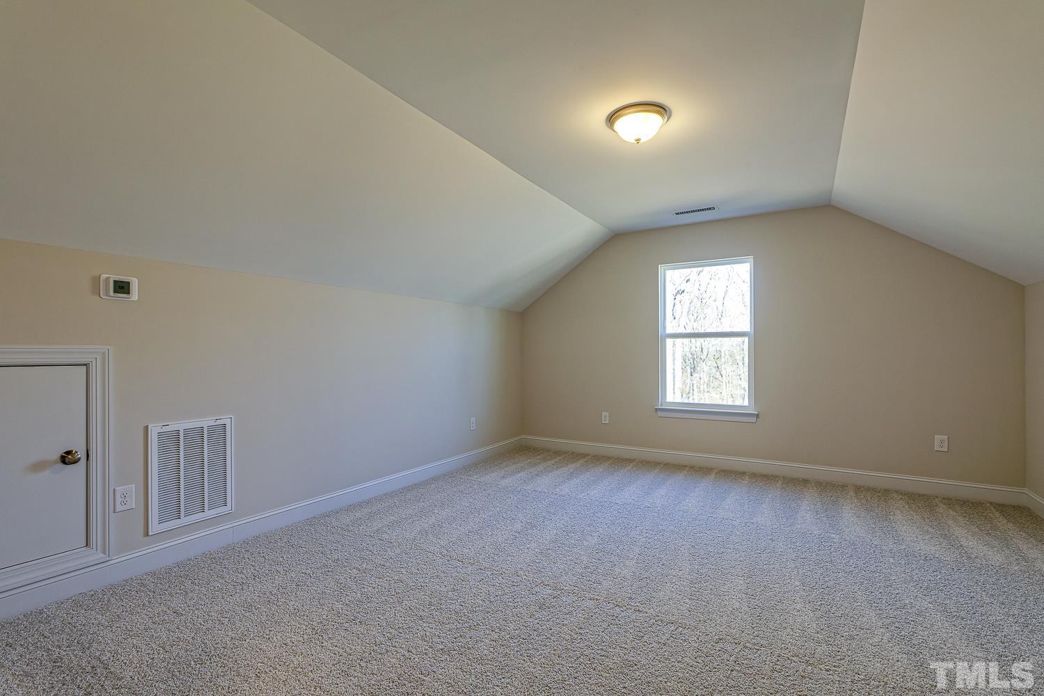 435 Cliffview Drive Garner, NC 27529 - Photo 39 of 45 an empty room with a window