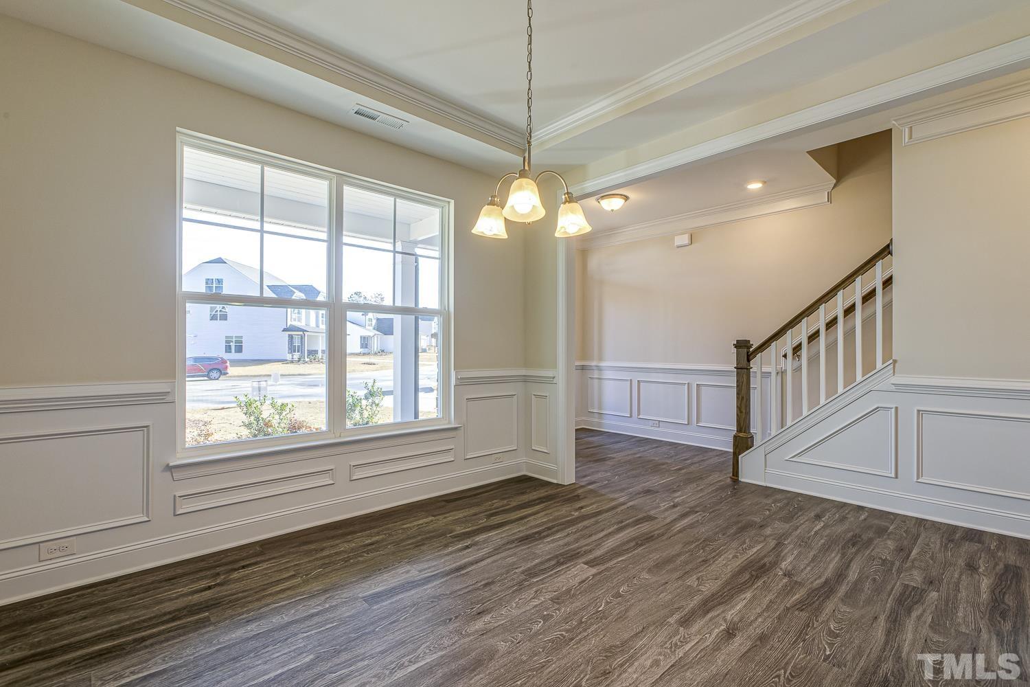 435 Cliffview Drive Garner, NC 27529 - Photo 6 of 45 a view of an entryway with wooden floor