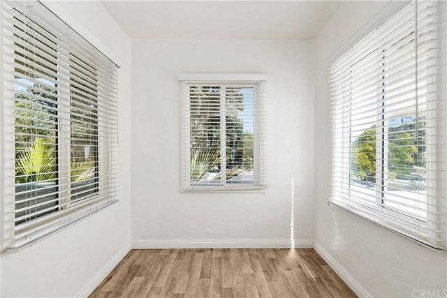 a view of a room that has a window in it