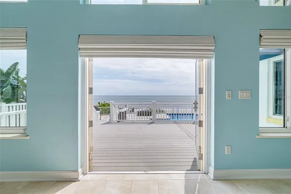 a view of an empty room with a white walls