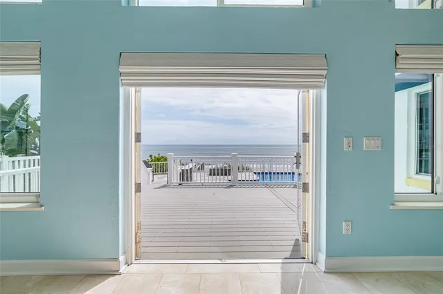 a view of an empty room with a white walls