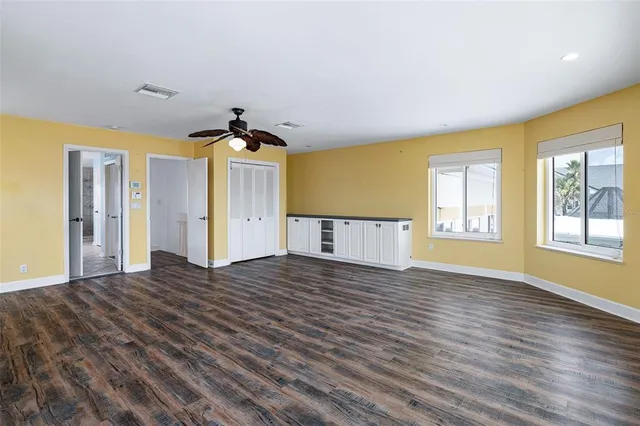 a bathroom with a sink a toilet and a shower
