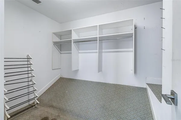 a view of a house with swimming pool in front of it