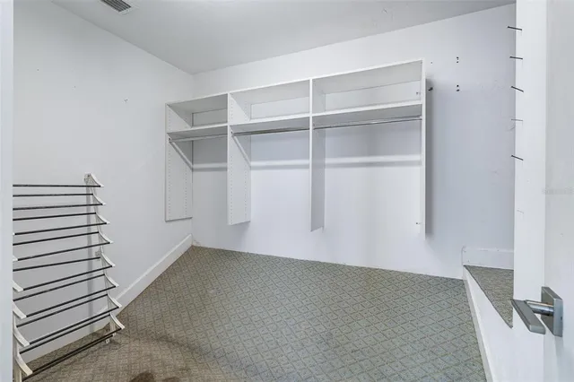 a view of a house with swimming pool in front of it