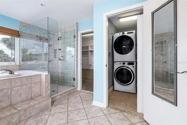 a view of balcony with wooden floor and fence