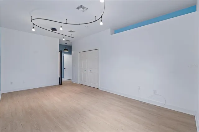 a view of water heater room with stairs