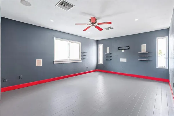 an aerial view of residential building and lake