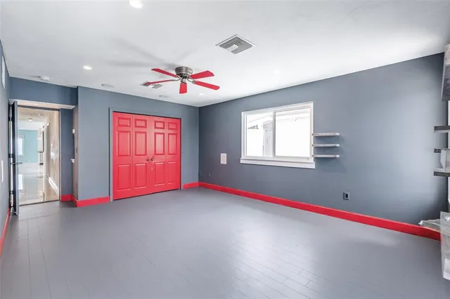 a view of swimming pool with a balcony