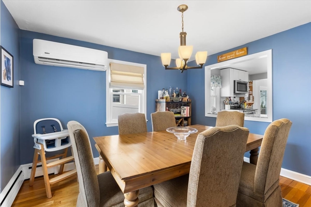 10 Earnshaw Street Boston, MA 02132 - Photo 12 of 35 a view of a dining room with furniture