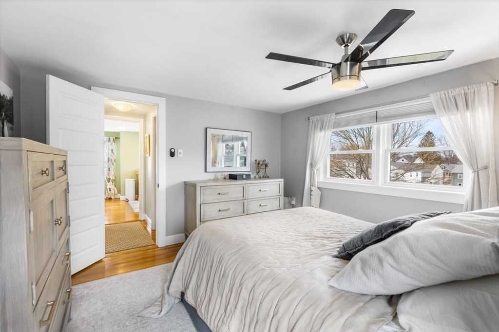 10 Earnshaw Street Boston, MA 02132 - Photo 19 of 35 a bedroom with a bed and a window