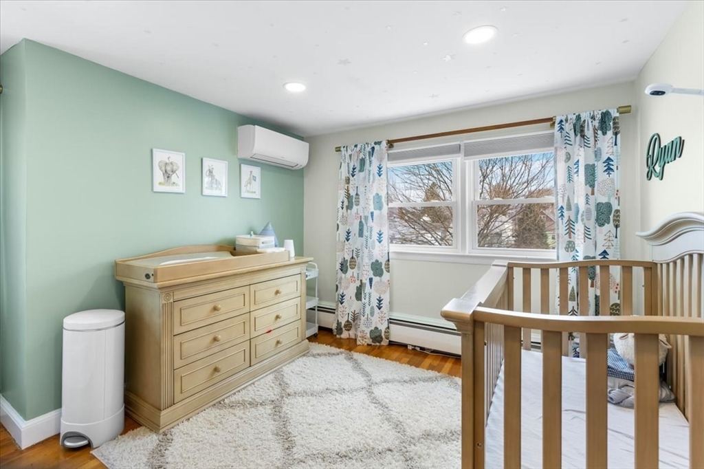 10 Earnshaw Street Boston, MA 02132 - Photo 22 of 35 a room with furniture and a window