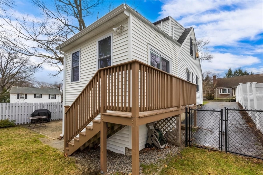 10 Earnshaw Street Boston, MA 02132 - Photo 31 of 35 a view of a house with wooden floor roof and roof
