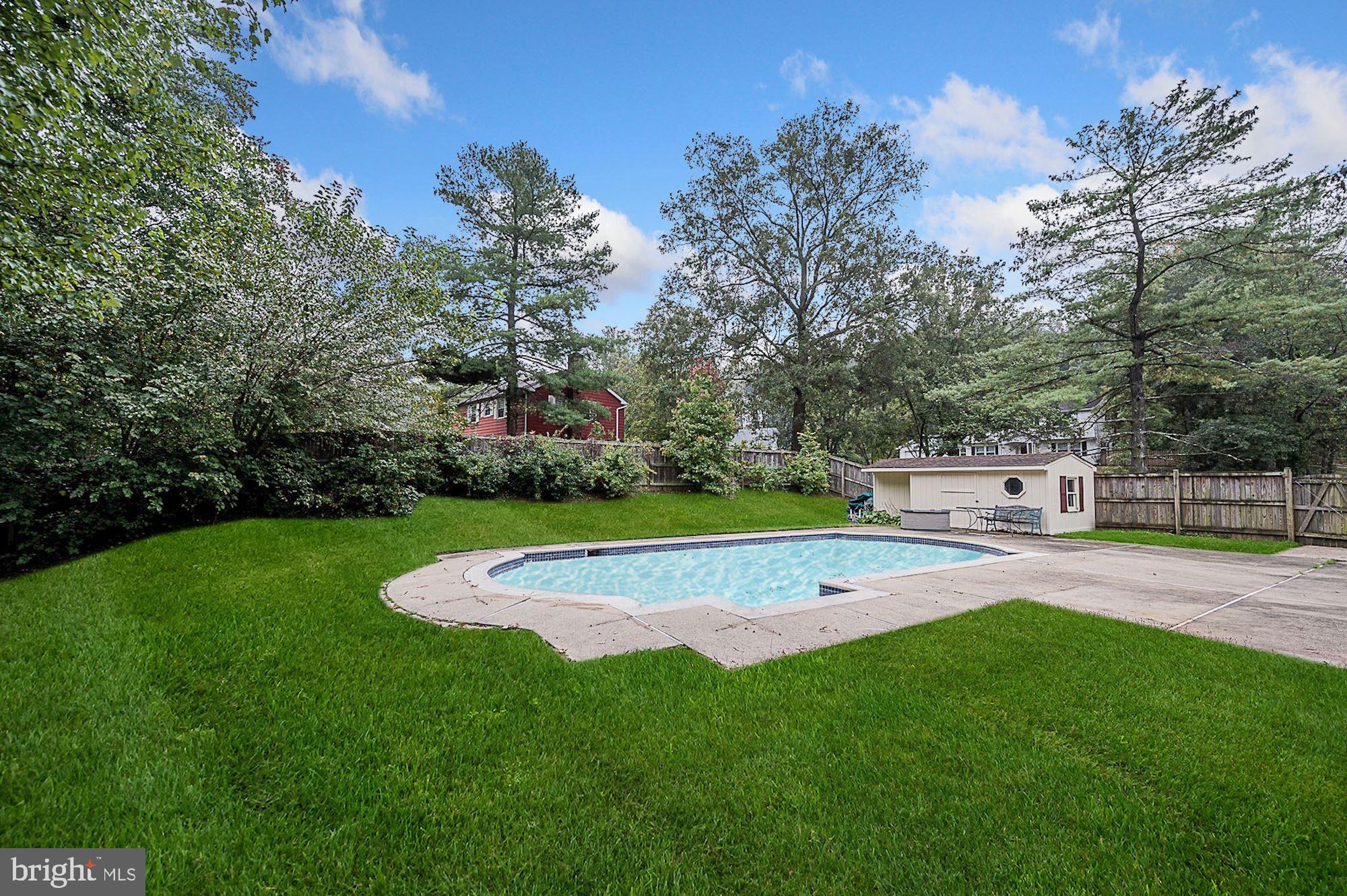 12401 Silverbirch Lane Laurel, MD 20708 - Photo 34 of 50 In-Ground Pool | Secure Storage