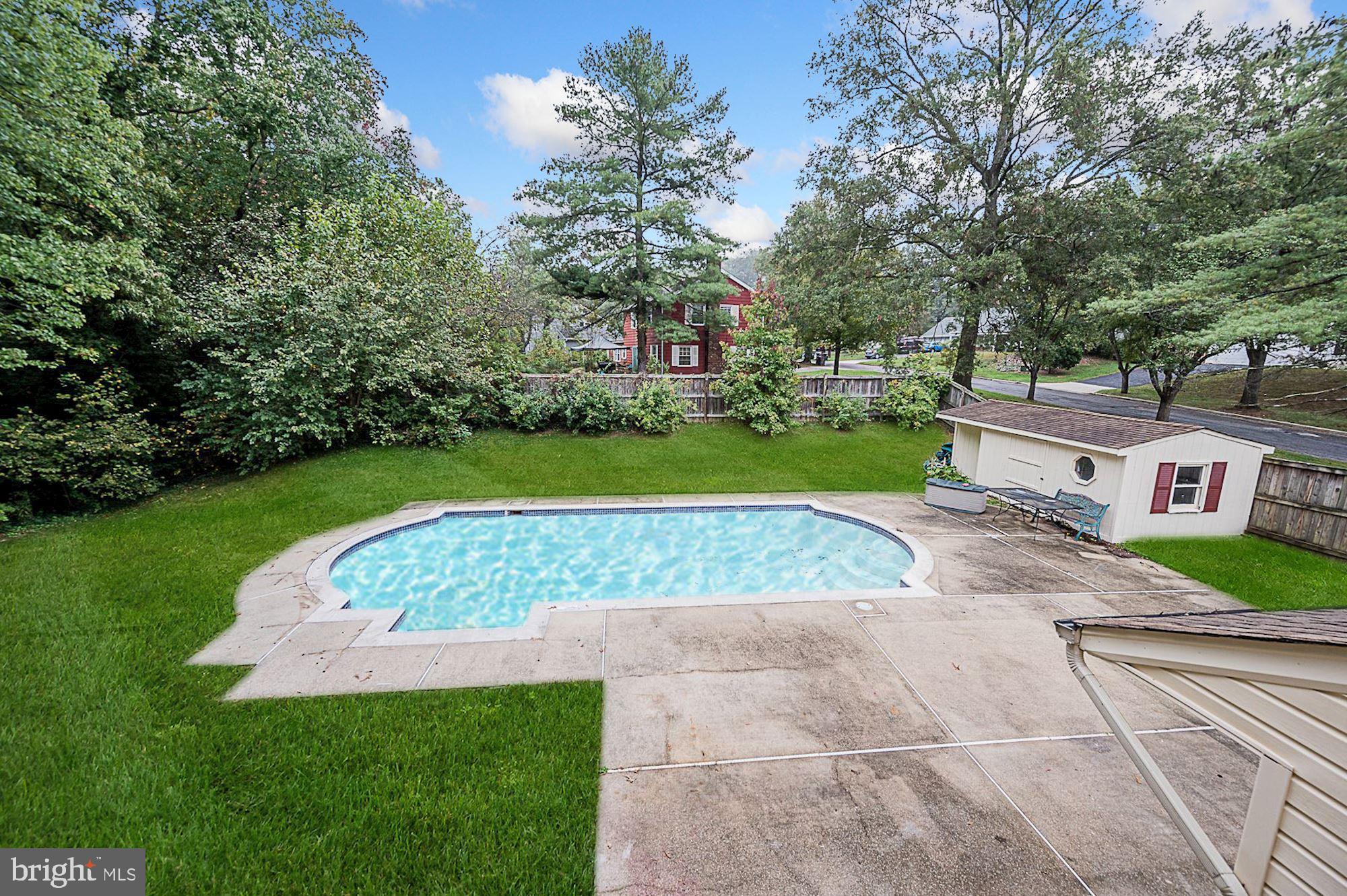 12401 Silverbirch Lane Laurel, MD 20708 - Photo 35 of 50 In-Ground Pool | Secure Storage