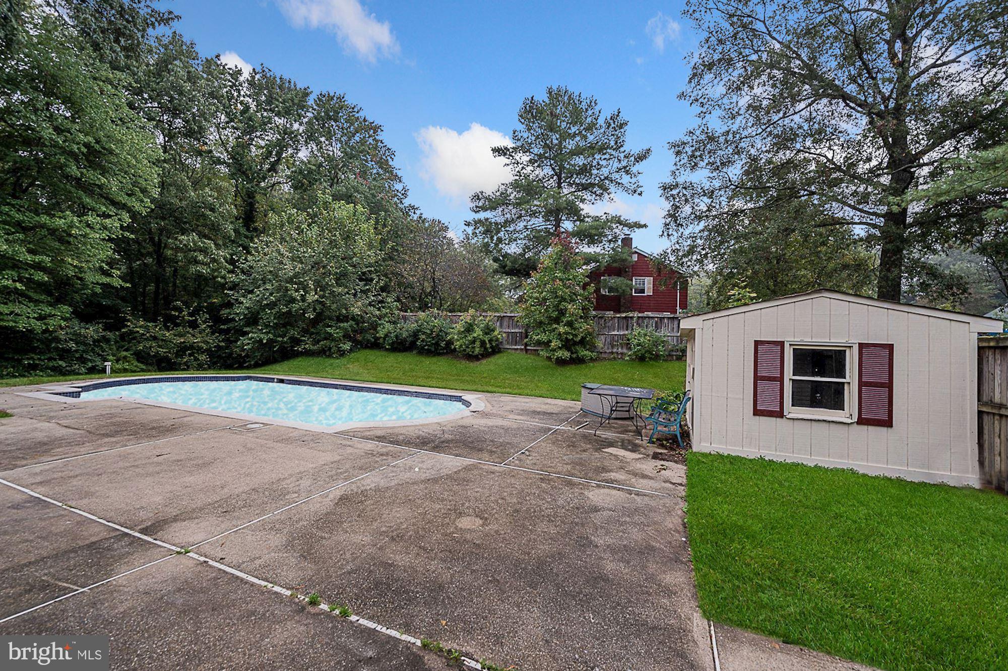 12401 Silverbirch Lane Laurel, MD 20708 - Photo 36 of 50 In-Ground Pool | Secure Storage