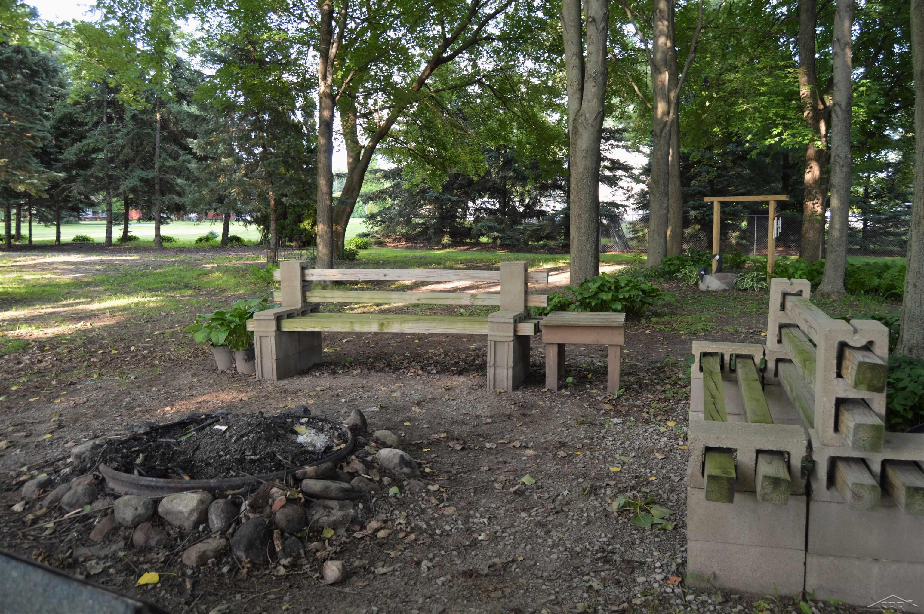 6150 Becker Road Saginaw, MI 48601 - Photo 21 of 32 Firepit with 3 benches