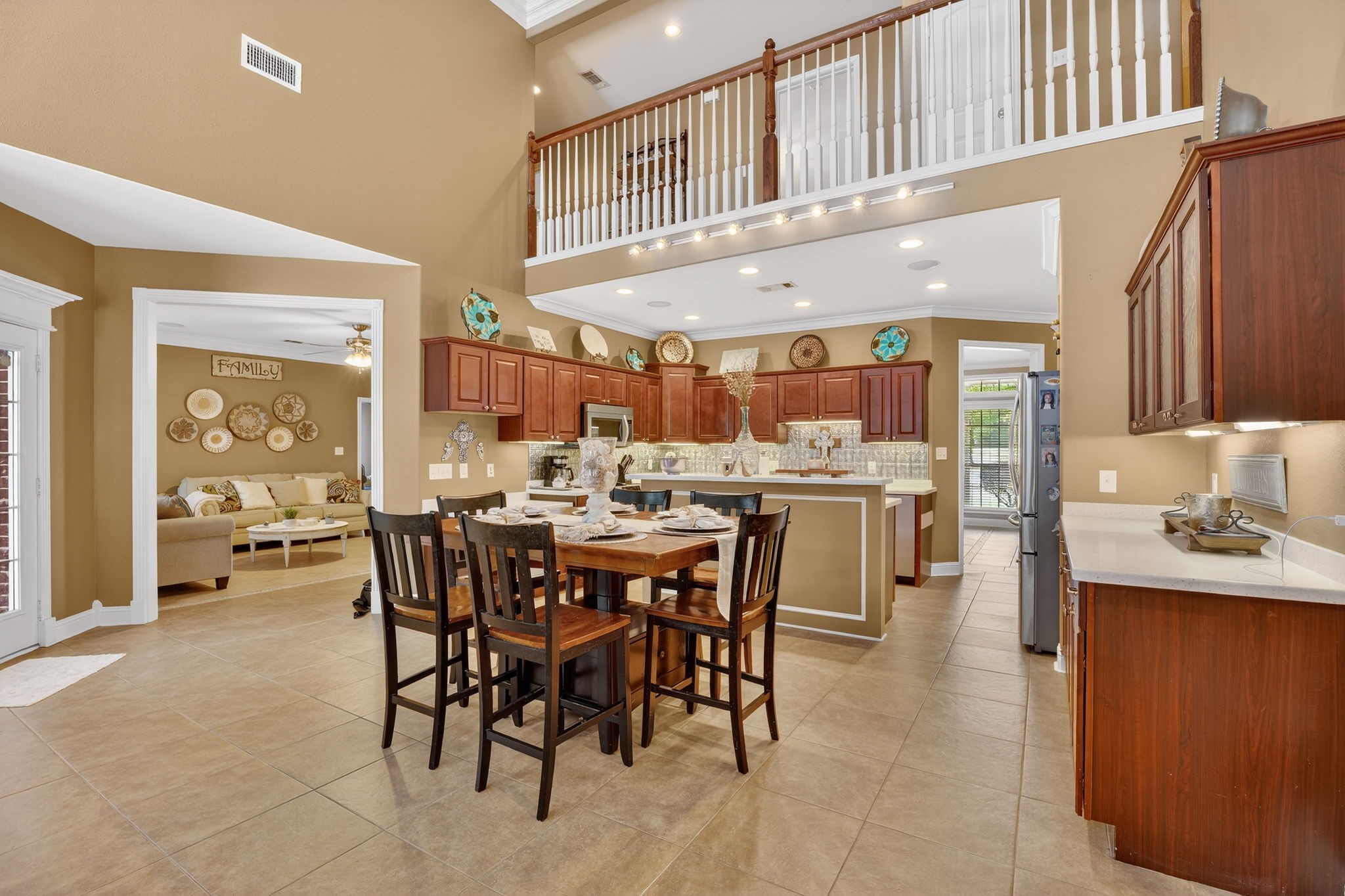 341 Billy Clark Road Huntington, TX 75949 - Photo 16 of 40 a dining area with a table chairs and a kitchen view