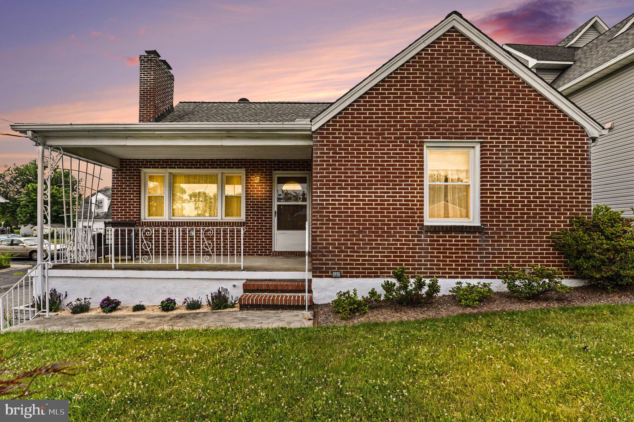 4125 Cliffvale Road Nottingham, MD 21236 - Photo 1 of 24 Charming brick home at sunset glow.