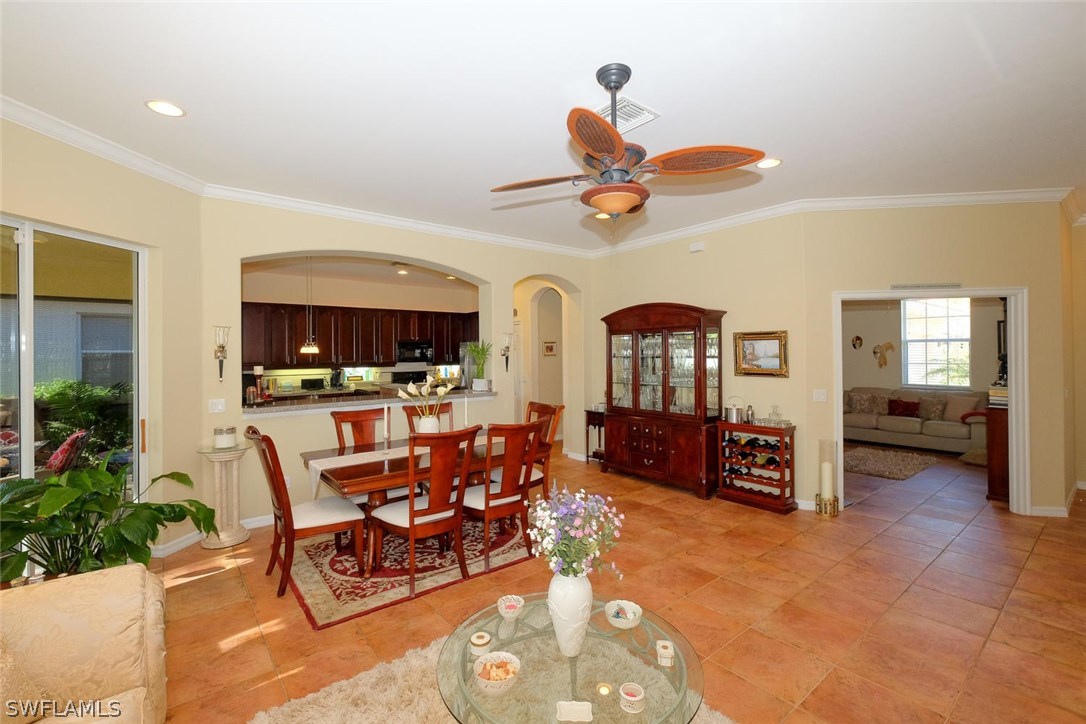 12882 Timber Ridge Drive Fort Myers, FL 33913 - Photo 5 of 25 a view of a livingroom with furniture and a large window
