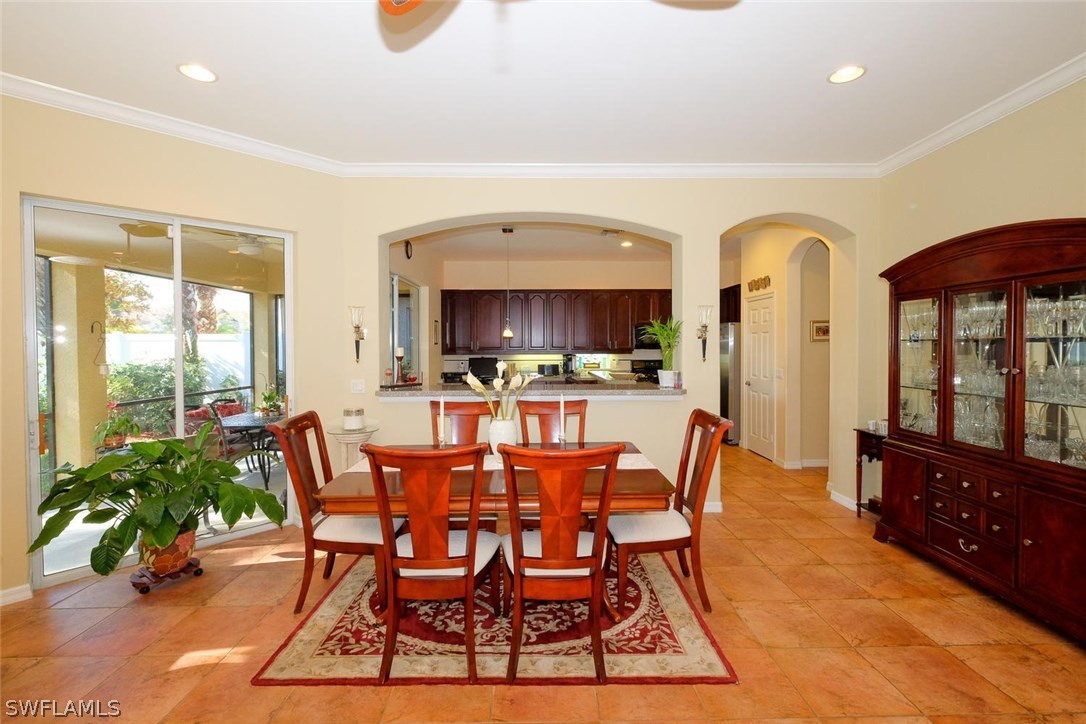 12882 Timber Ridge Drive Fort Myers, FL 33913 - Photo 6 of 25 a dining room with furniture and window