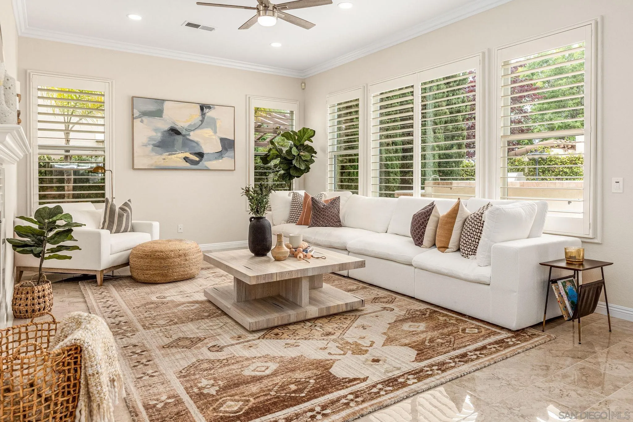 5582 Valerio Trail San Diego, CA 92130 - Photo 14 of 43 a living room with furniture and a large window