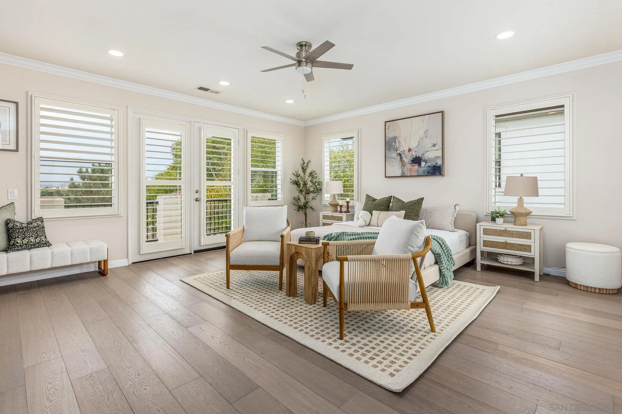 5582 Valerio Trail San Diego, CA 92130 - Photo 25 of 43 a living room with furniture and wooden floor