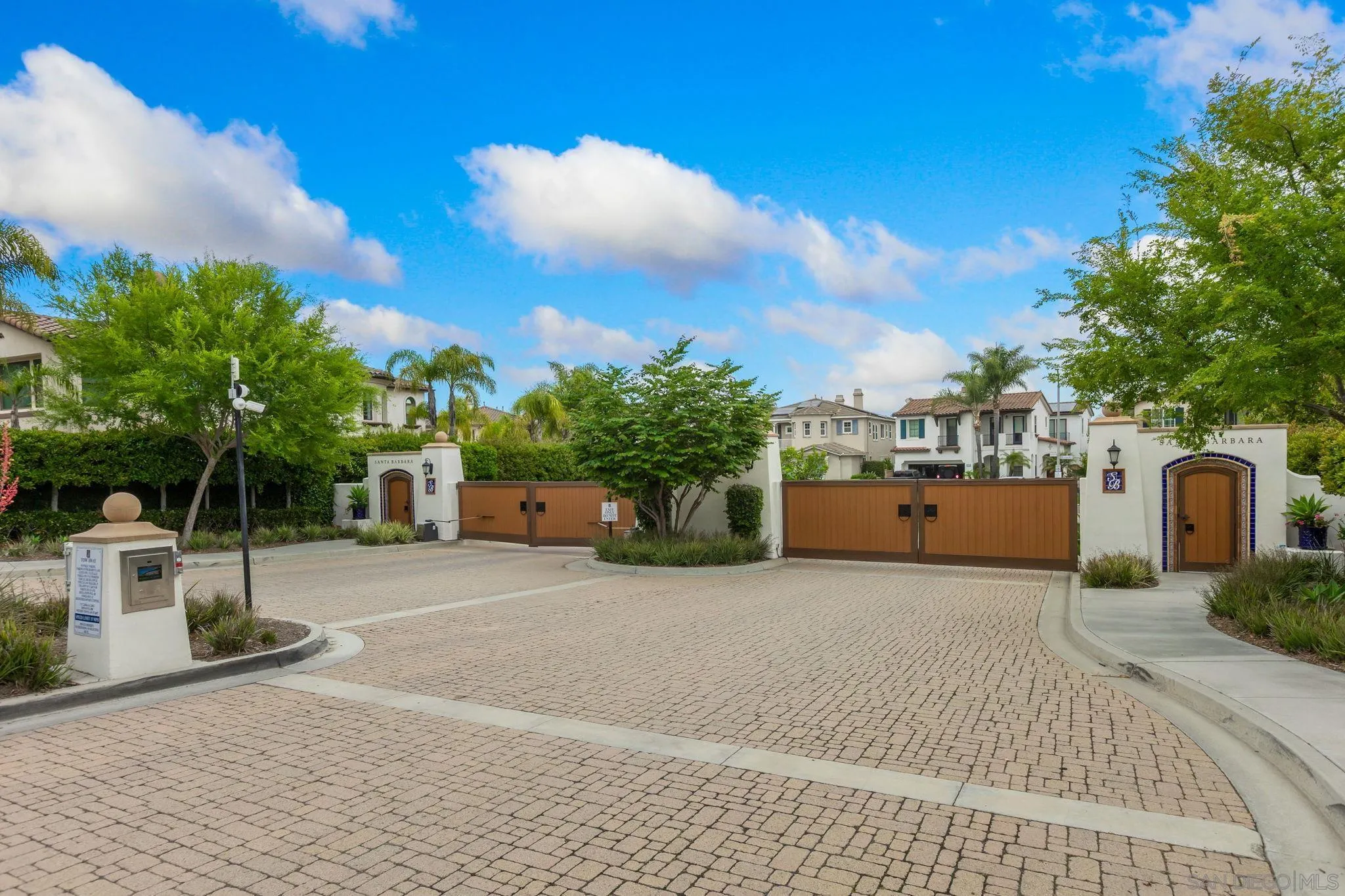 5582 Valerio Trail San Diego, CA 92130 - Photo 34 of 43 a view of a house with a yard and sitting area