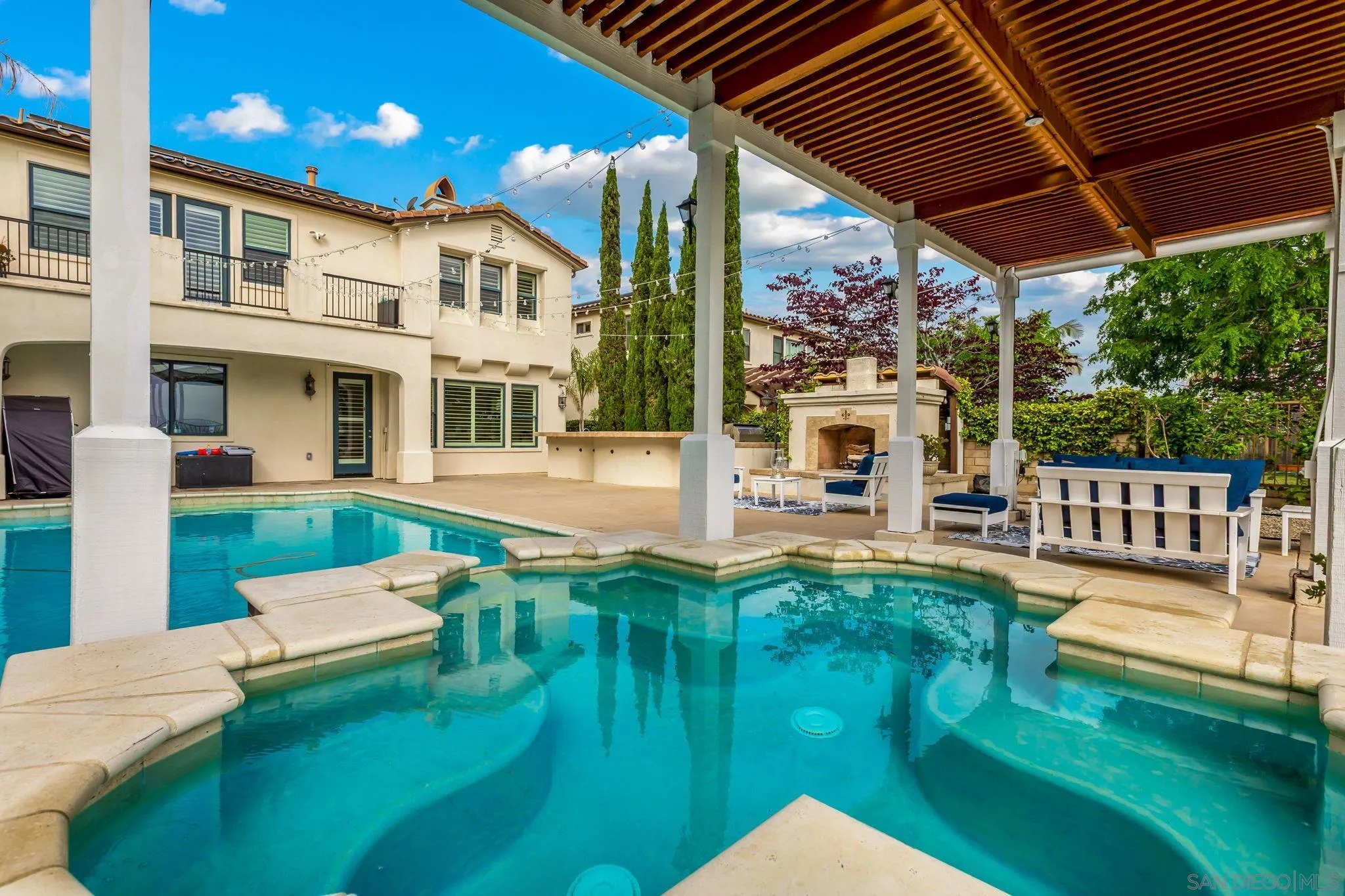 5582 Valerio Trail San Diego, CA 92130 - Photo 43 of 43 a view of a house with pool and a yard