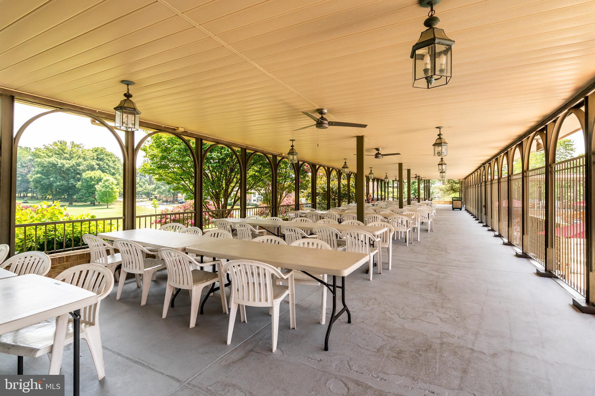 3110 Adderley Court, Unit 245A Silver Spring, MD 20906 - Photo 22 of 27 a outdoor dining space with furniture and outdoor view