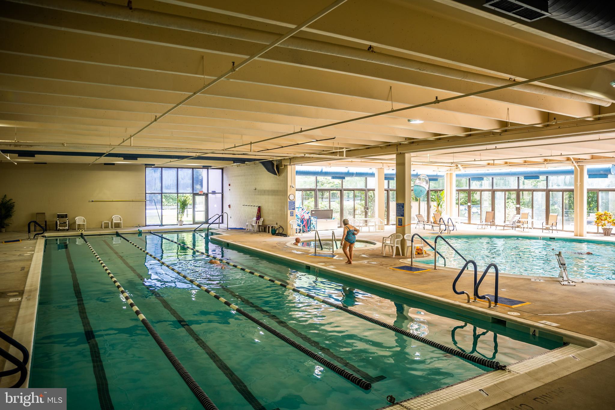 3110 Adderley Court, Unit 245A Silver Spring, MD 20906 - Photo 26 of 27 a view of swimming pool with outdoor seating