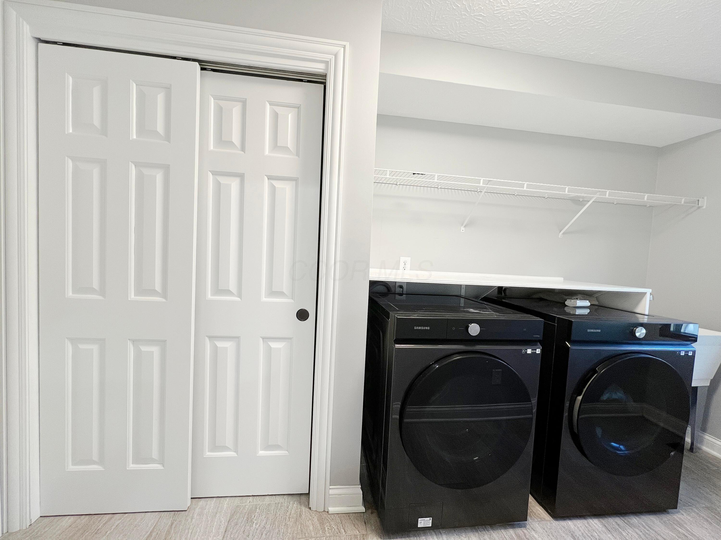 7792 Rodebaugh Road Reynoldsburg, OH 43068 - Photo 21 of 53 Large Laundry Room