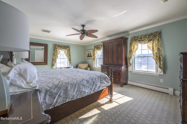 a bathroom with a black white checkered floor and a black white checkered floor