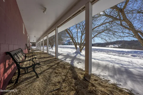 a utility room with sink dryer and washer