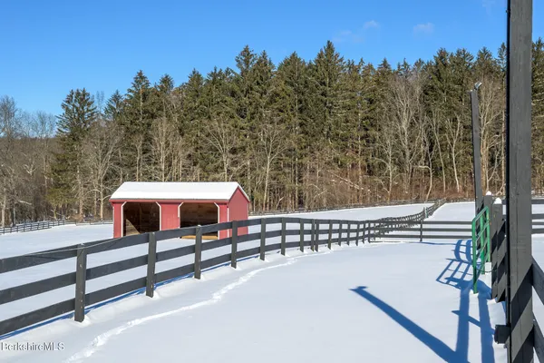 a view of a red and white house