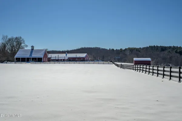 a front view of a house with a bed