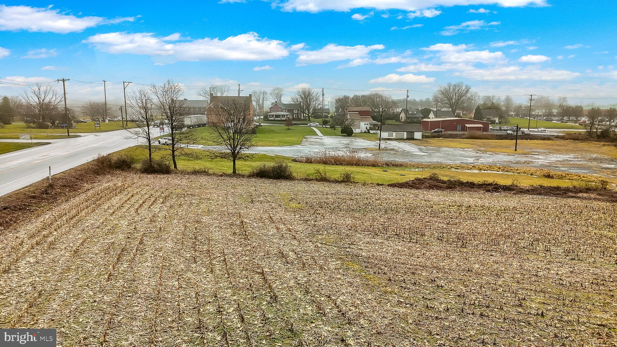 230 North Jennersville Road West Grove, PA 19390 - Photo 3 of 14 a view of a lake with houses in the background