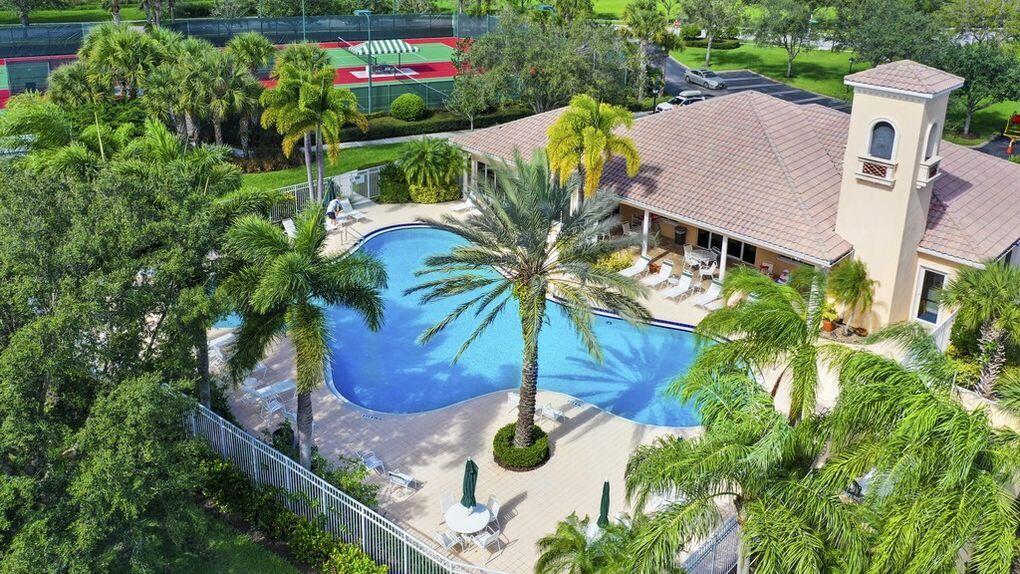 8657 Southeast Nicolete Lane Hobe Sound, FL 33455 - Photo 50 of 50 a view of yard and patio