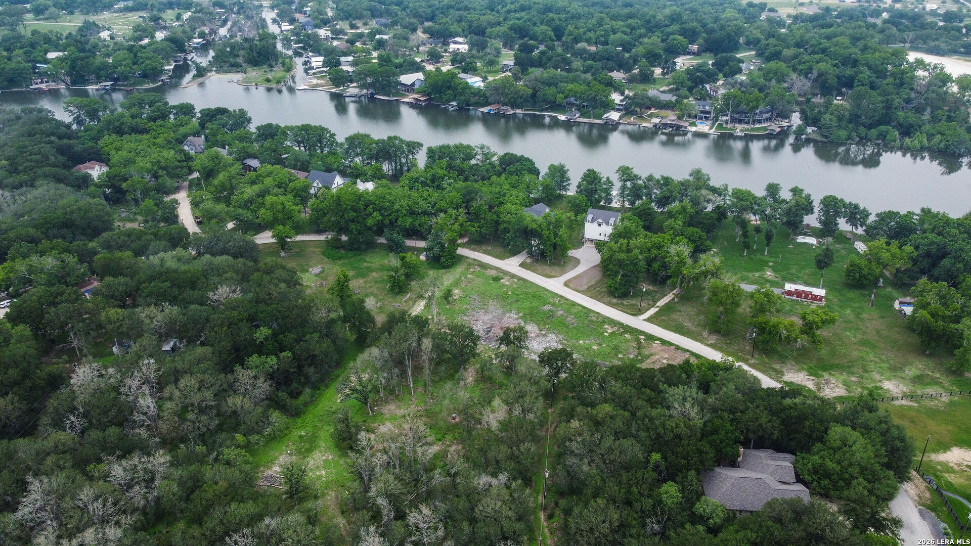 Tbd Chickasaw Centre Seguin, TX 78155 - Photo 12 of 15 a aerial view of a house with a yard and lake view