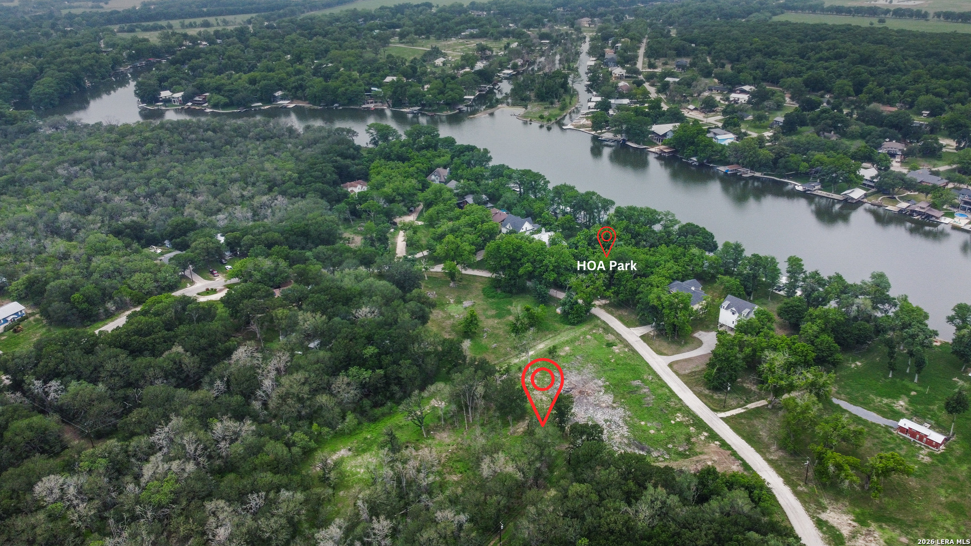 Tbd Chickasaw Centre Seguin, TX 78155 - Photo 4 of 15 an aerial view of residential houses with outdoor space and trees