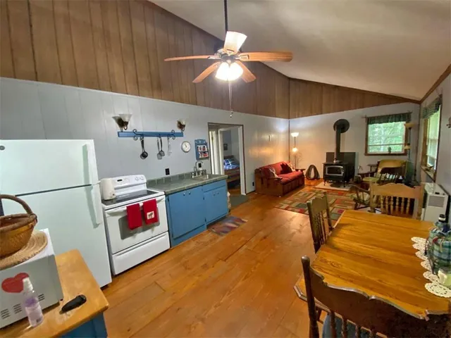 a very nice looking room with kitchen
