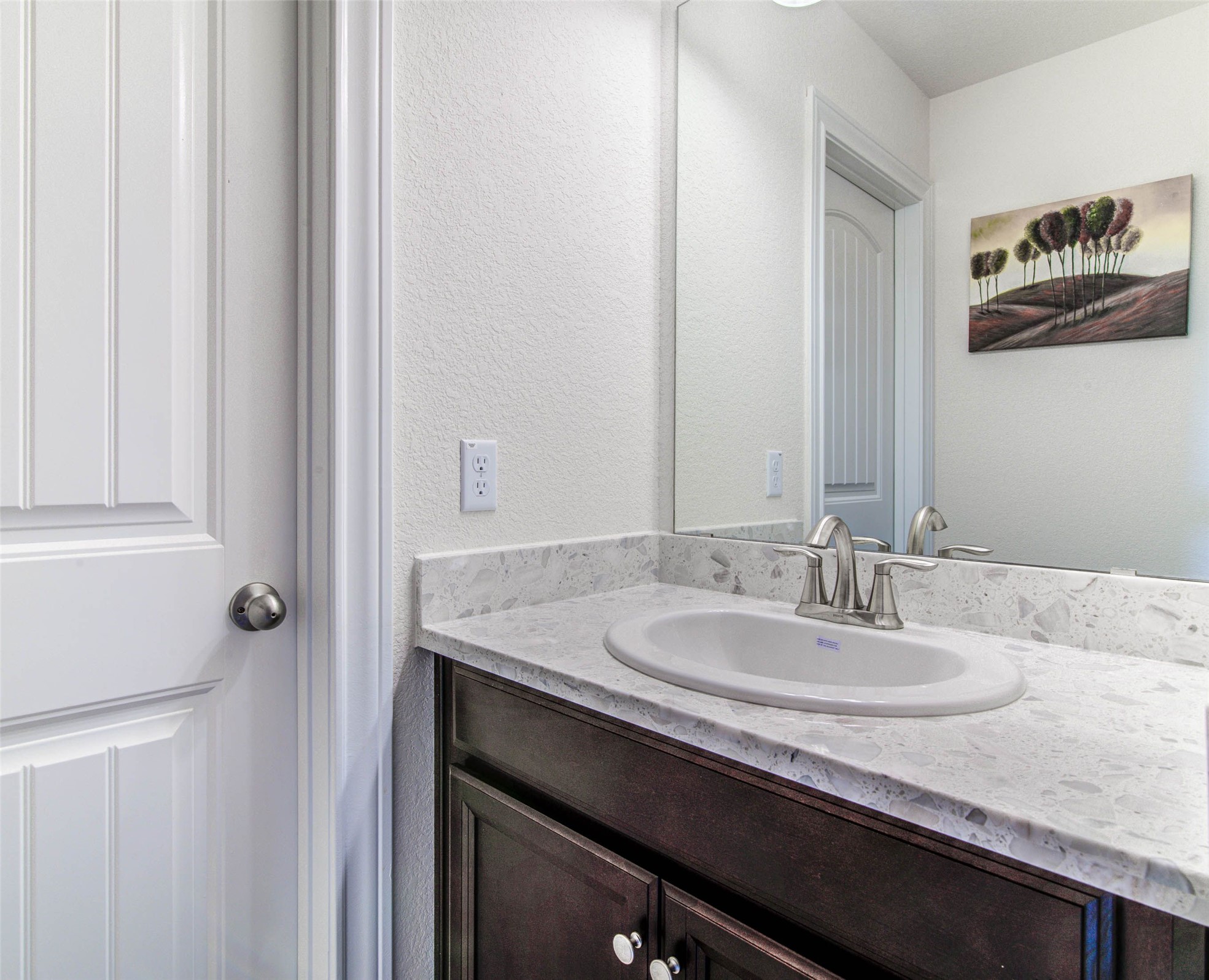 15621 Cabrillo Way Austin, TX 78738 - Photo 14 of 21 a bathroom with a granite countertop sink and a mirror