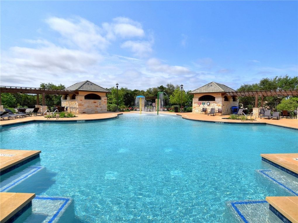15621 Cabrillo Way Austin, TX 78738 - Photo 18 of 21 a view of a house with a big yard and large trees