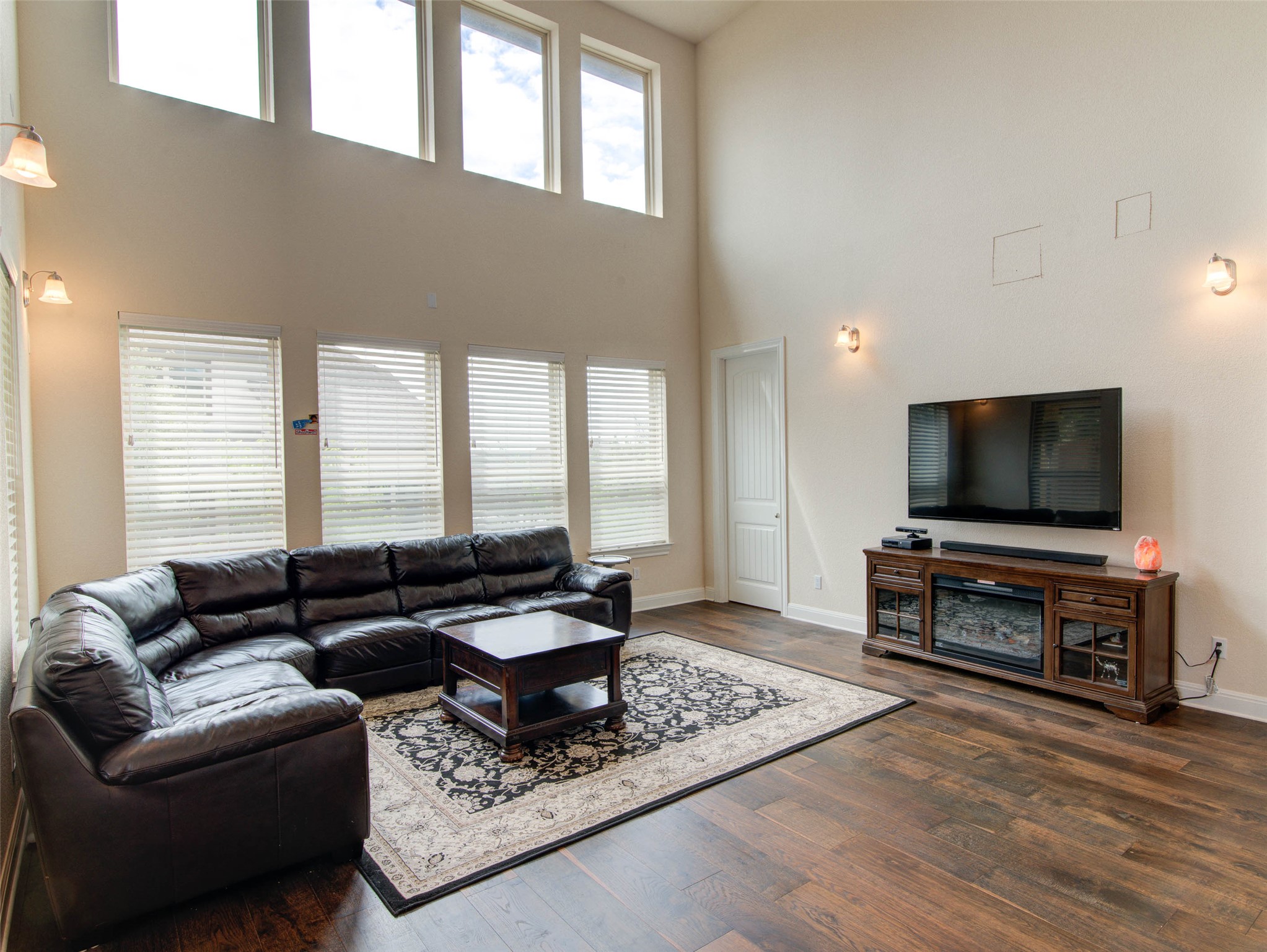 15621 Cabrillo Way Austin, TX 78738 - Photo 9 of 21 a living room with furniture and a flat screen tv