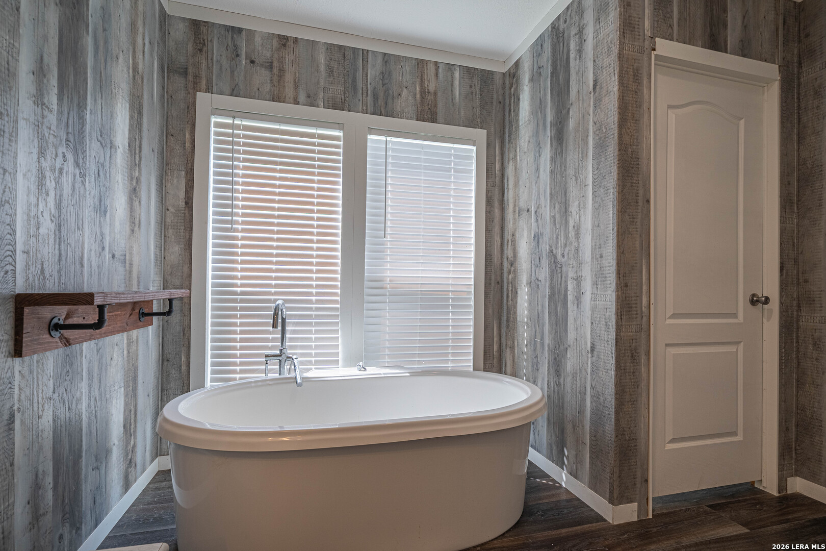 3433 Gander Slough Road Kingsbury, TX 78638 - Photo 14 of 23 a bathroom with a sink and a bathtub