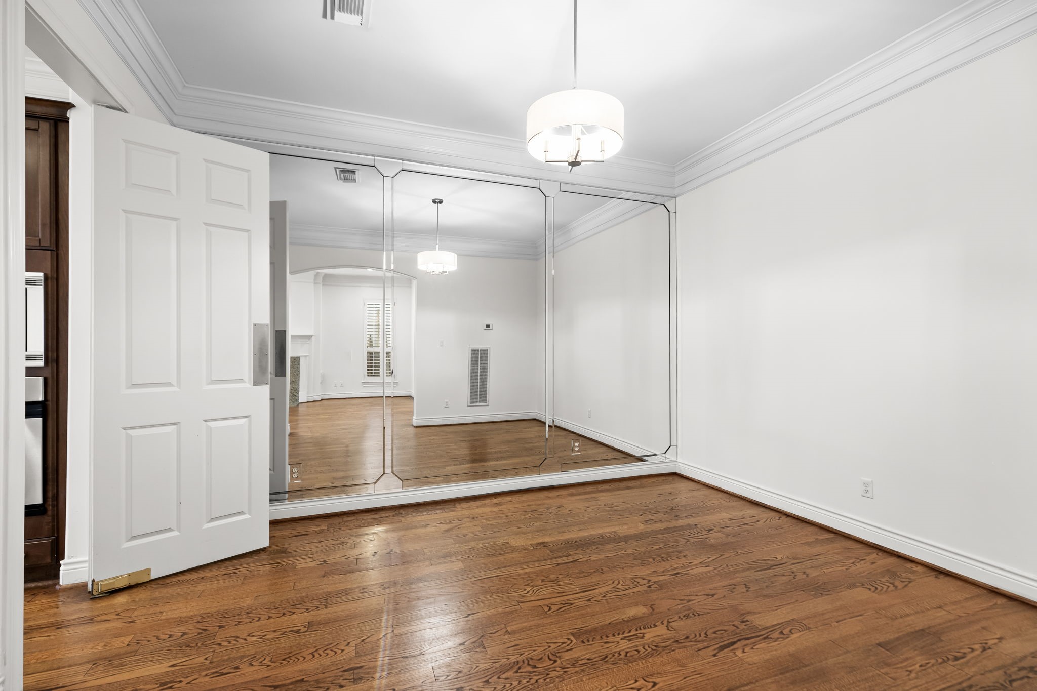 4026 Gramercy Street Houston, TX 77025 - Photo 14 of 35 an empty room with wooden floor
