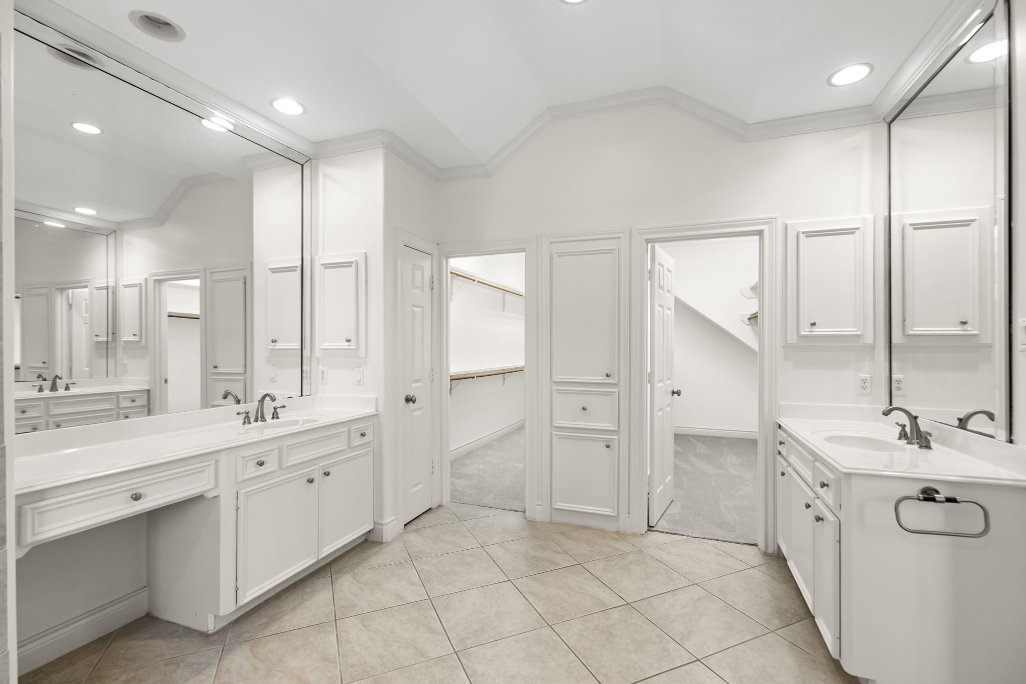 4026 Gramercy Street Houston, TX 77025 - Photo 17 of 35 a spacious bathroom with a double vanity sink mirror and double